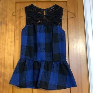 Peplum royal blue and black top. Sheer lace back.